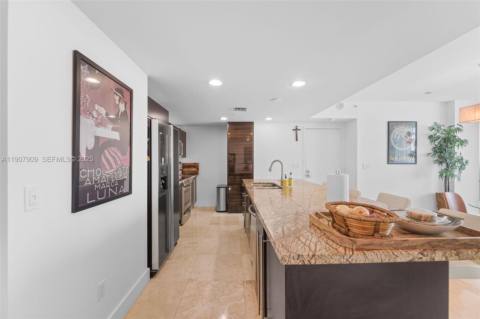 665 Northeast 25th Street, Unit PHI01 Miami, FL 33137 - Photo 13 of 38 a view of a very nice looking dining room with furniture