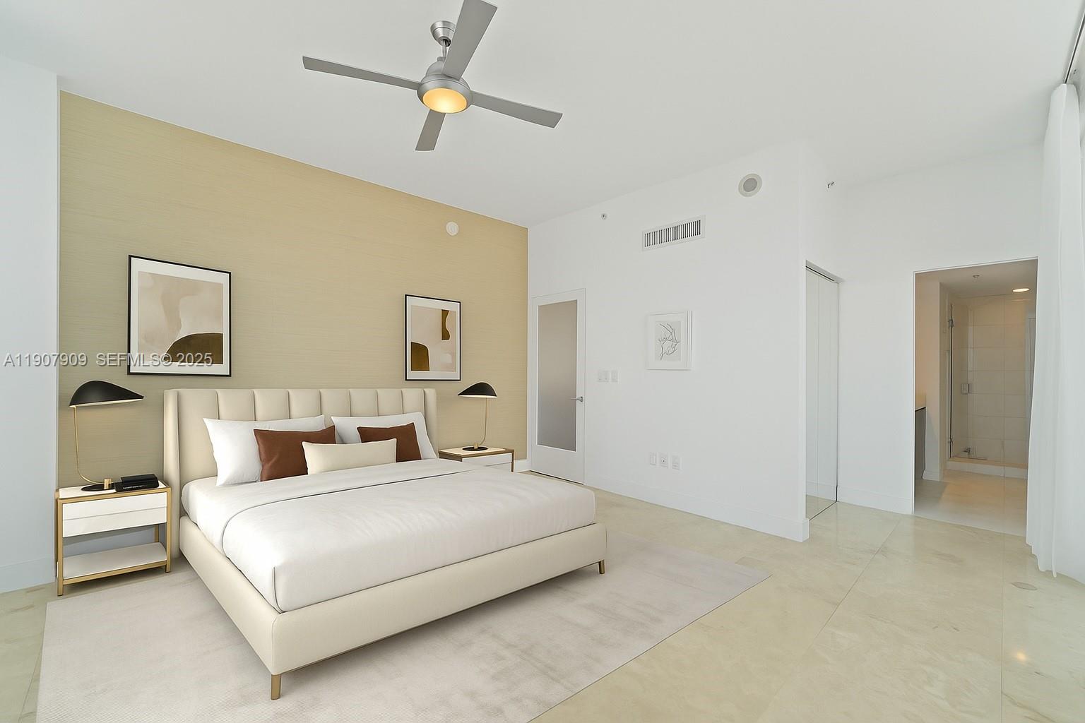 665 Northeast 25th Street, Unit PHI01 Miami, FL 33137 - Photo 21 of 38 a bedroom with a bed a ceiling fan and a dresser