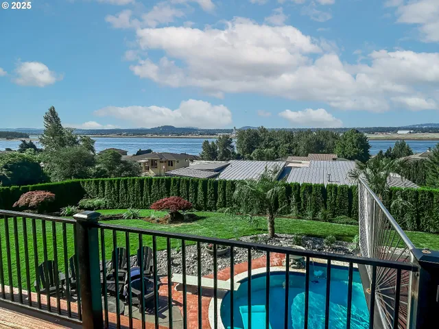 a view of a garden and deck