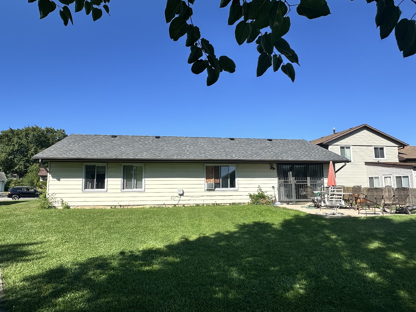 3525 Marseilles Lane Hazel Crest, IL 60429 - Photo 5 of 5 a front view of a house with a garden and yard