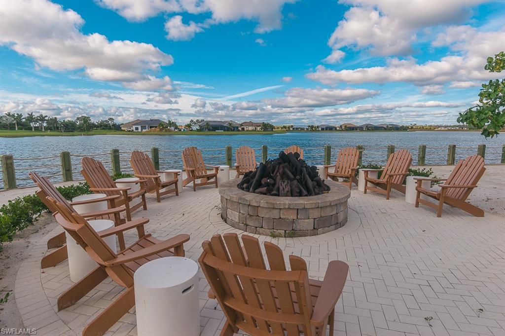 14670 Catamaran Place Naples, FL 34114 - Photo 21 of 24 a view of a roof deck with furniture
