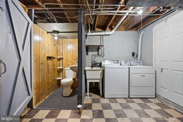 a utility room with a washer and dryer