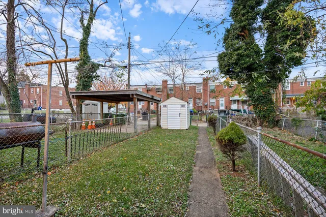 a garden view with a seating space