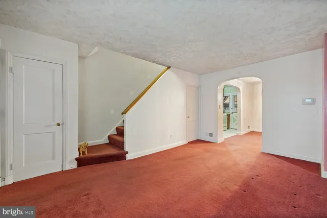 a view of a room with a staircase