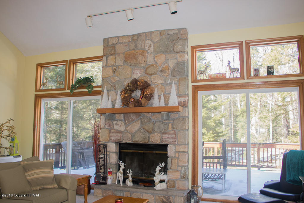 402 Sawmill Road Pocono Lake, PA 18347 - Photo 5 of 42 stone faced fireplace