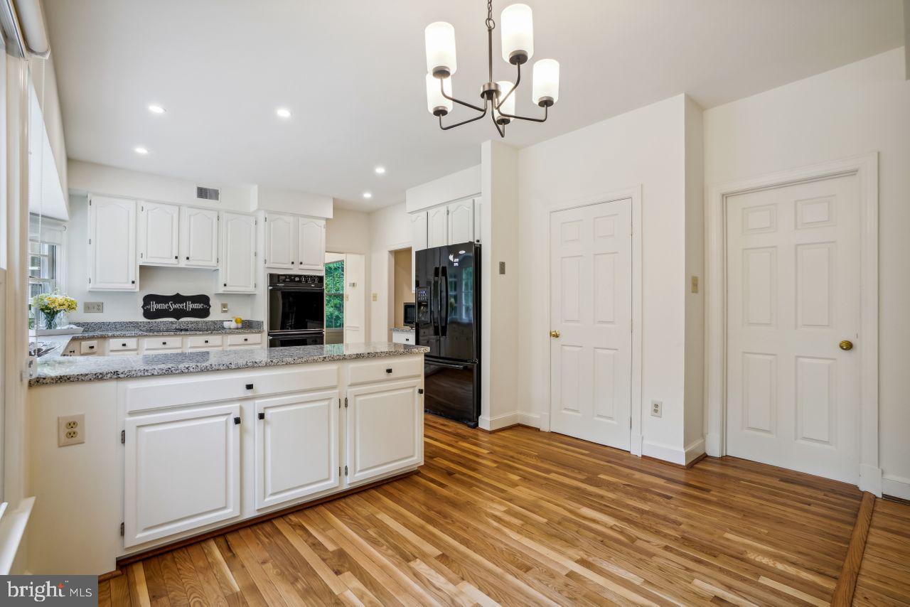 2311 Ridge Tree Court Ellicott City, MD 21042 - Photo 11 of 66 Breakfast Area & Kitchen Beautiful Hardwood Floors