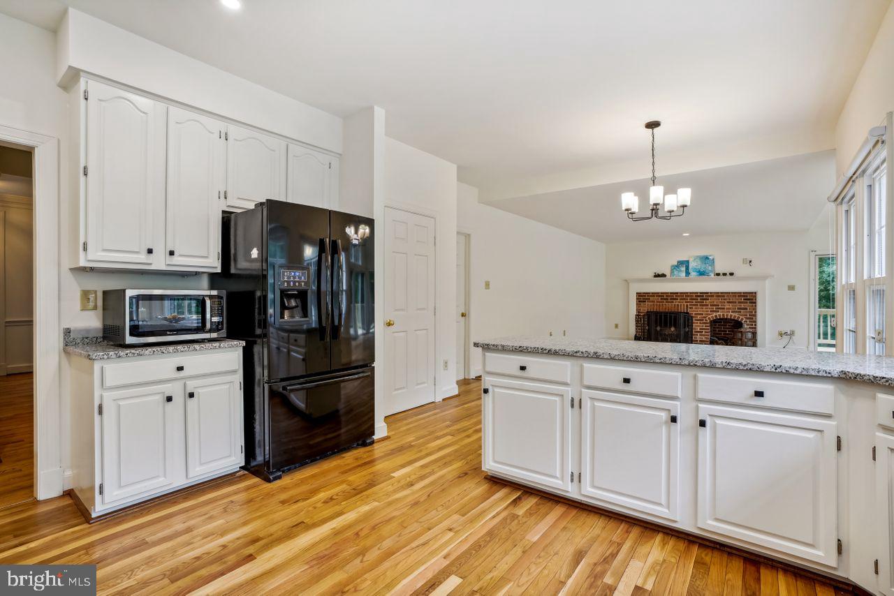 2311 Ridge Tree Court Ellicott City, MD 21042 - Photo 13 of 66 Kitchen w/Beautiful Recently Refinished Floors
