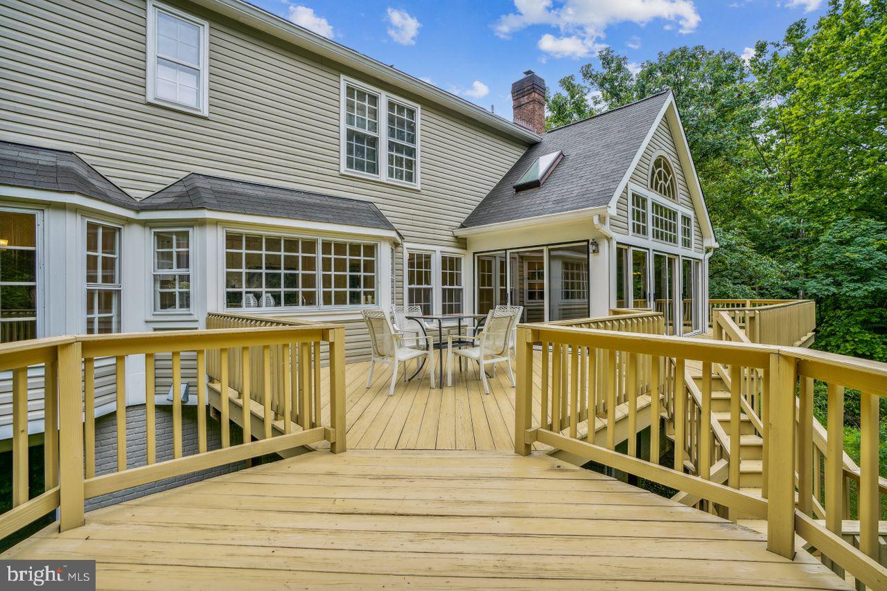 2311 Ridge Tree Court Ellicott City, MD 21042 - Photo 45 of 66 Large Deck from Cozy Hexagonal Section