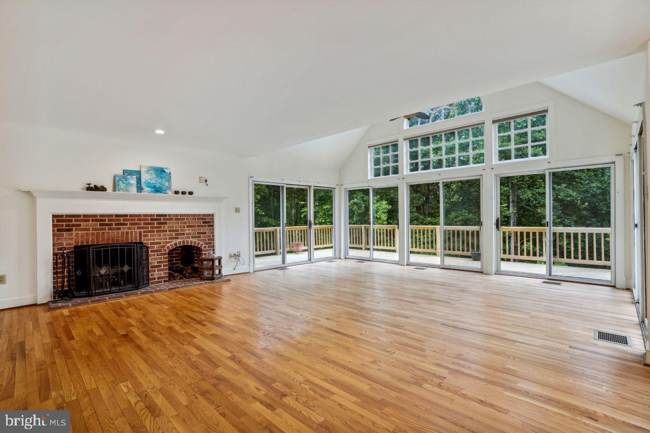 2311 Ridge Tree Court Ellicott City, MD 21042 - Photo 8 of 66 Family Room & Conservatory w/5 Sliding Glass Doors