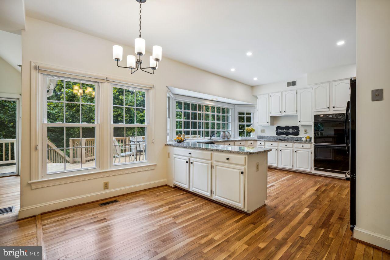 2311 Ridge Tree Court Ellicott City, MD 21042 - Photo 10 of 66 Breakfast Area & Kitchen, Picture Window, Parkland