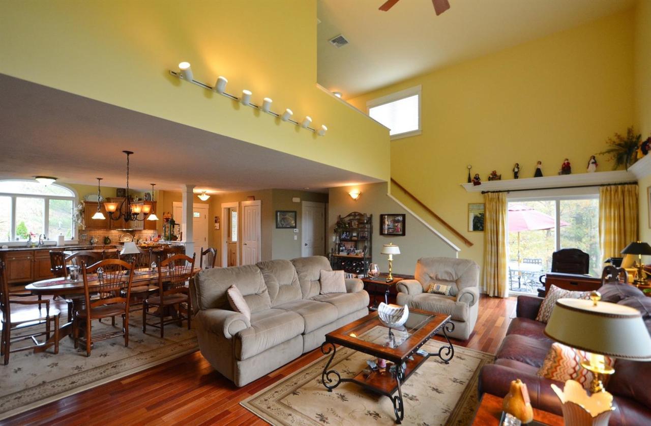 13 Aspen Road Buzzards Bay, MA 02532 - Photo 13 of 29 a living room with furniture and a large window