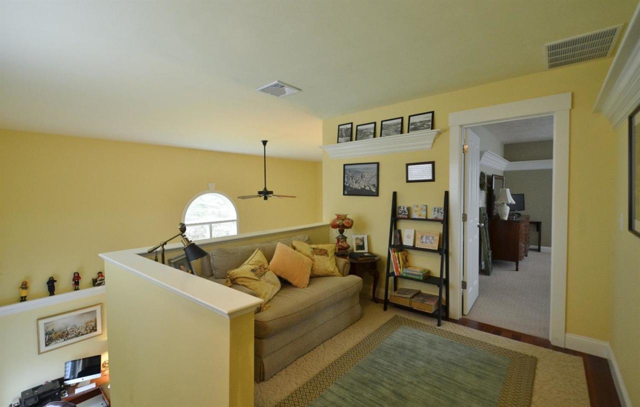 13 Aspen Road Buzzards Bay, MA 02532 - Photo 20 of 29 a living room with furniture and a wooden floor