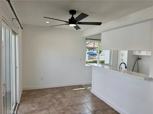 a view of a living room and window