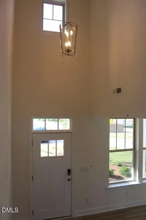 a view of a house with backyard