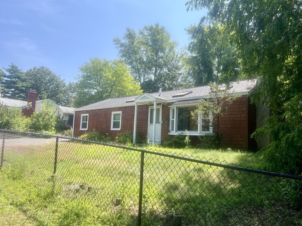 69 Keddy Street Springfield, MA 01109 - Photo 3 of 15 a view of a house with backyard and garden