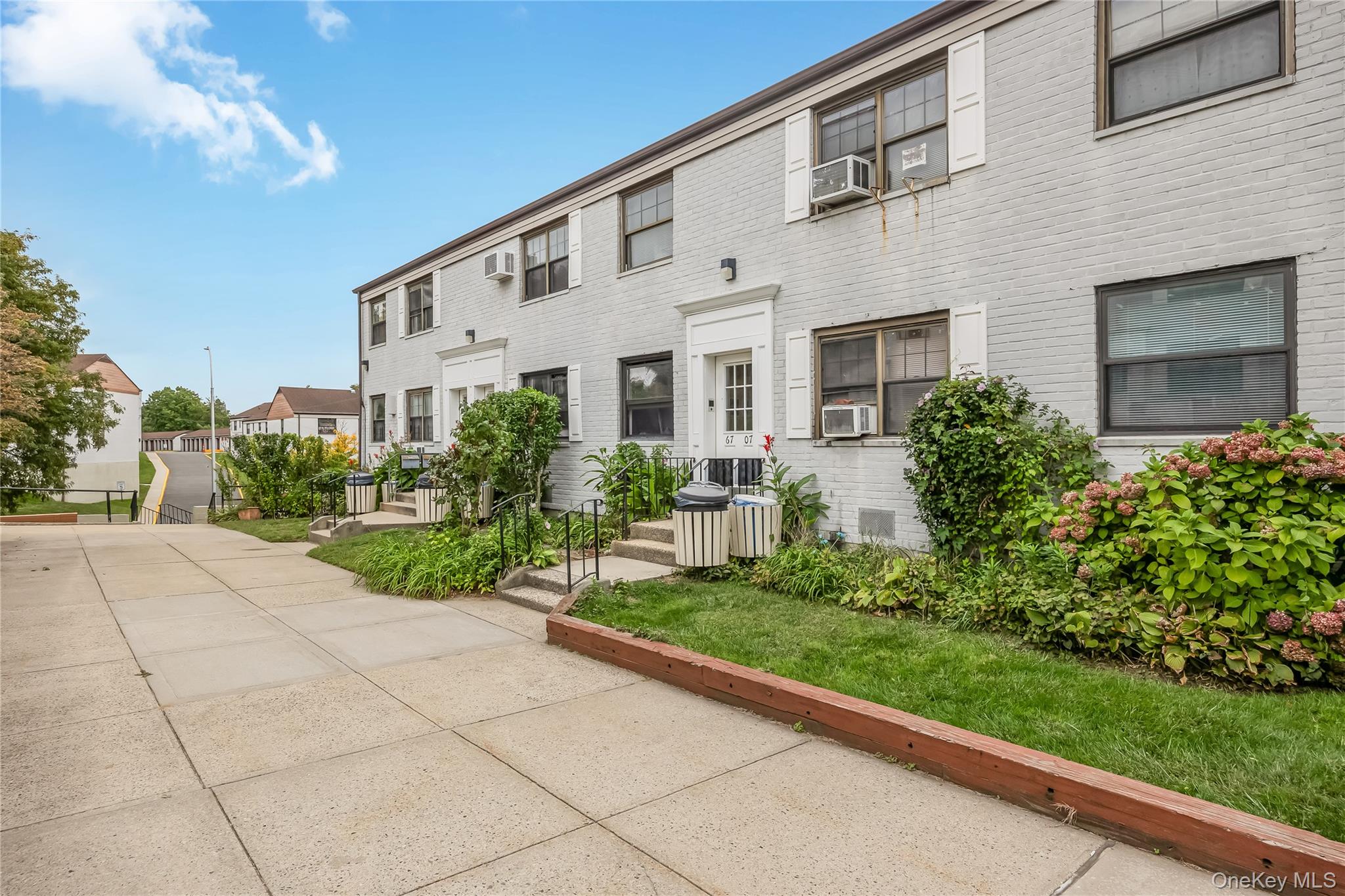 6703 136th Street, Unit B Queens, NY 11367 - Photo 14 of 14 a house view with a garden space