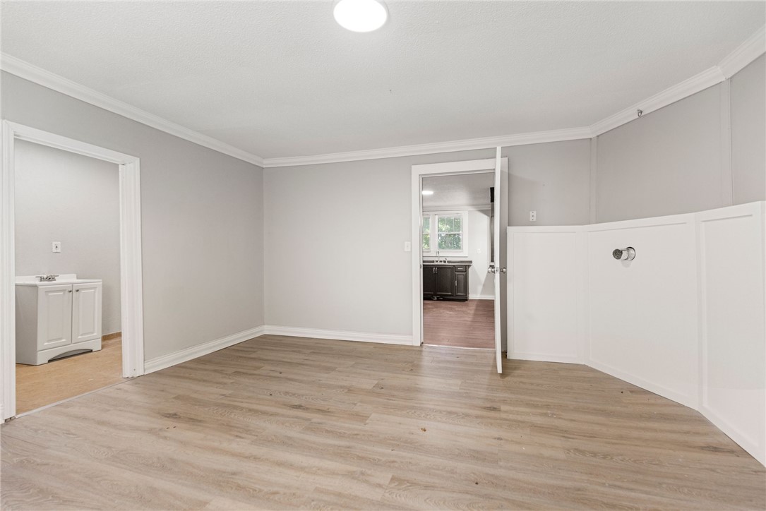 109 Farmer Street Anderson, SC 29621 - Photo 25 of 31 Clean lines and light-colored flooring create a versatile living area ready for personalization.