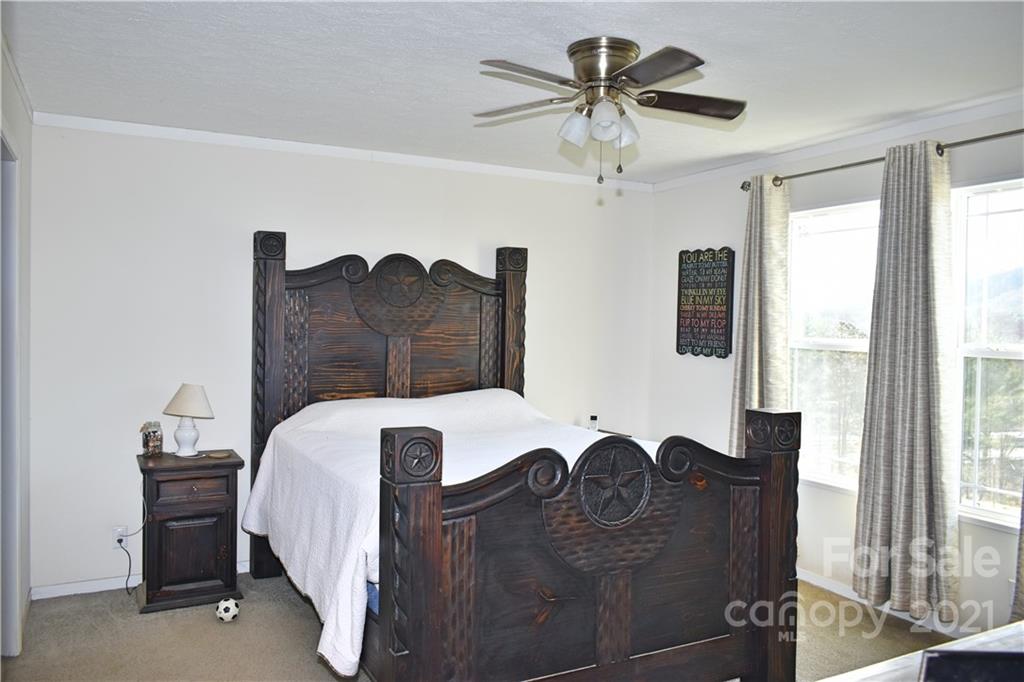 11 Fernwood Road Clyde, NC 28721 - Photo 12 of 26 a view of a balcony with furniture