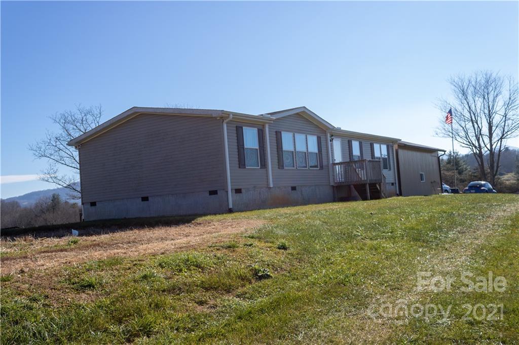 11 Fernwood Road Clyde, NC 28721 - Photo 3 of 26 a house view with a outdoor space