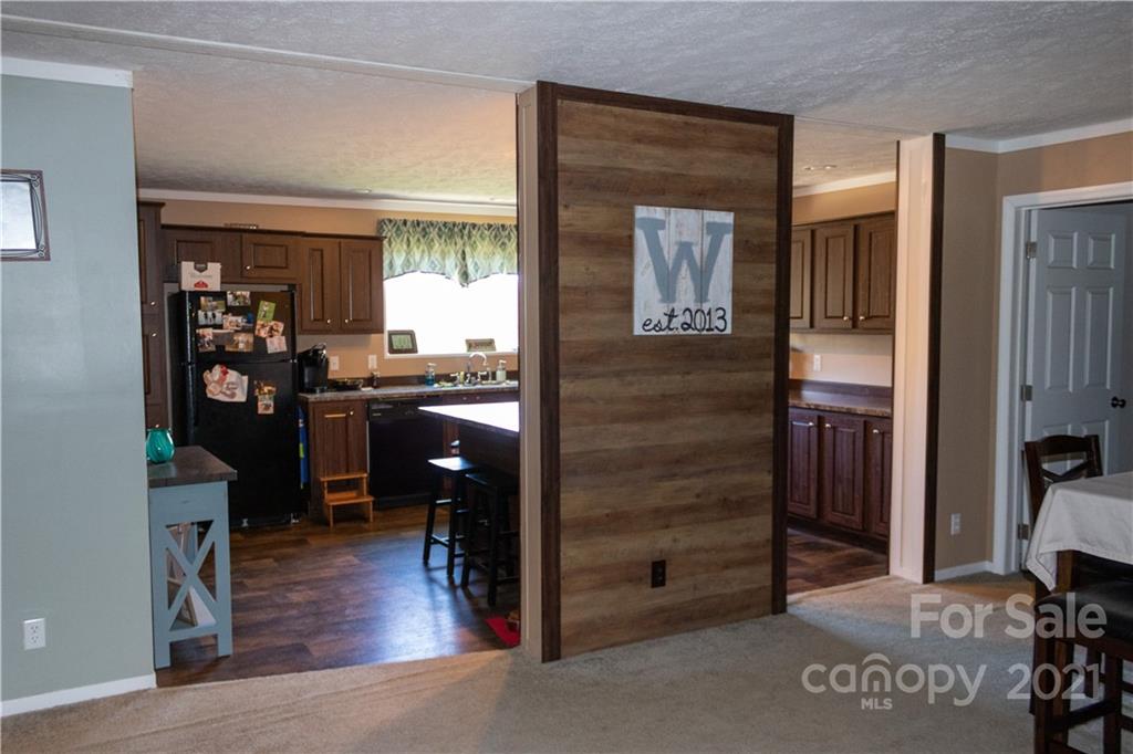 11 Fernwood Road Clyde, NC 28721 - Photo 8 of 26 a living room with furniture and wooden floor