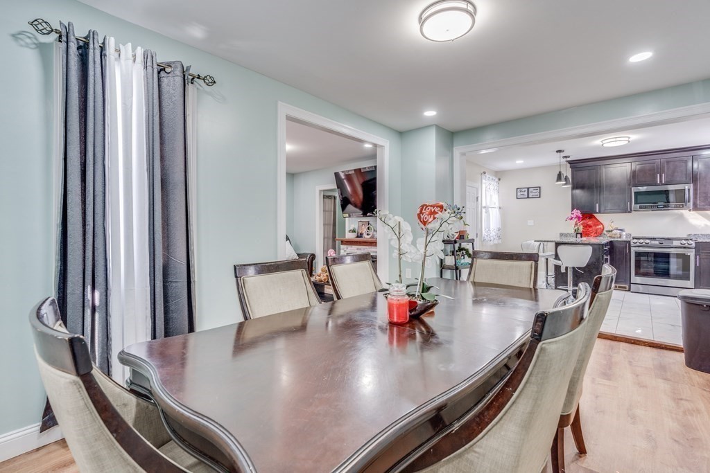 33 Ladd Street Springfield, MA 01109 - Photo 8 of 17 a view of a dining room with furniture and a window