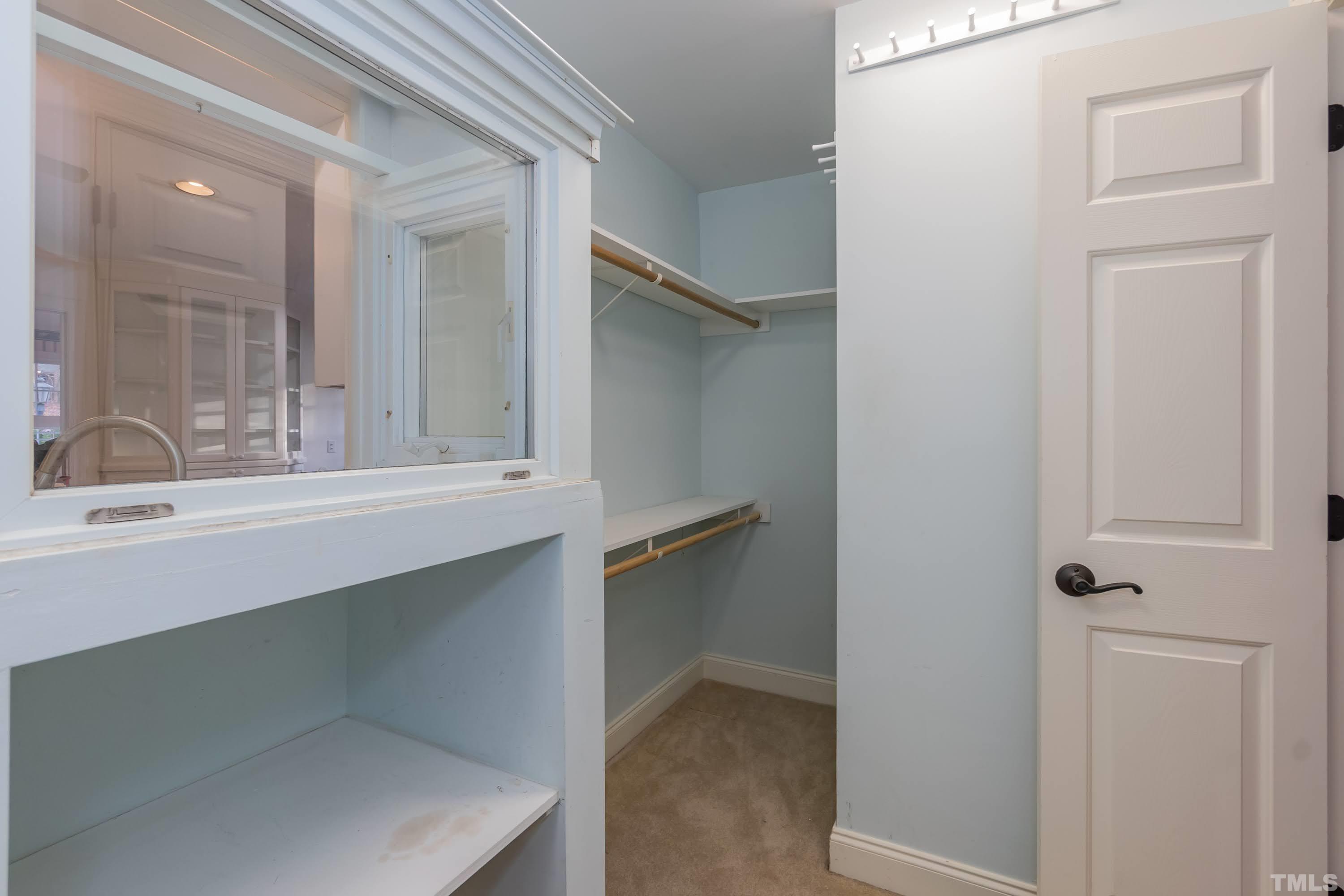 1104 Deboy Street Raleigh, NC 27606 - Photo 17 of 38 a bathroom with a sink and a mirror