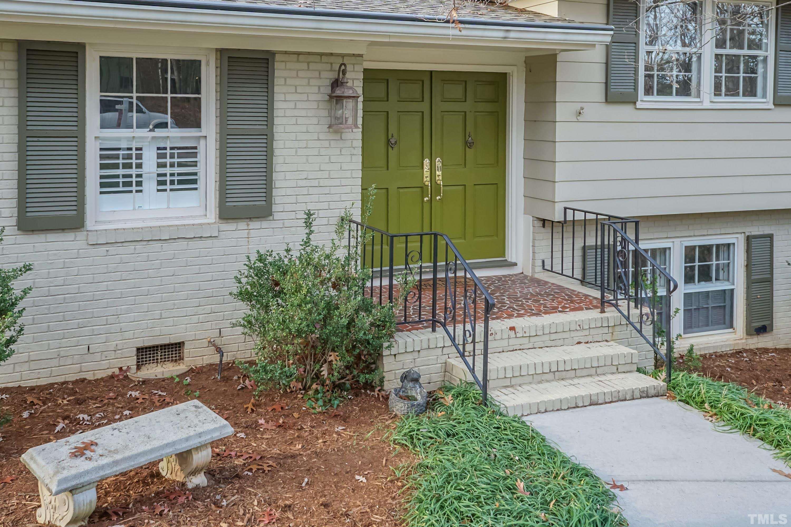 1104 Deboy Street Raleigh, NC 27606 - Photo 21 of 38 a view of a house with a small garden