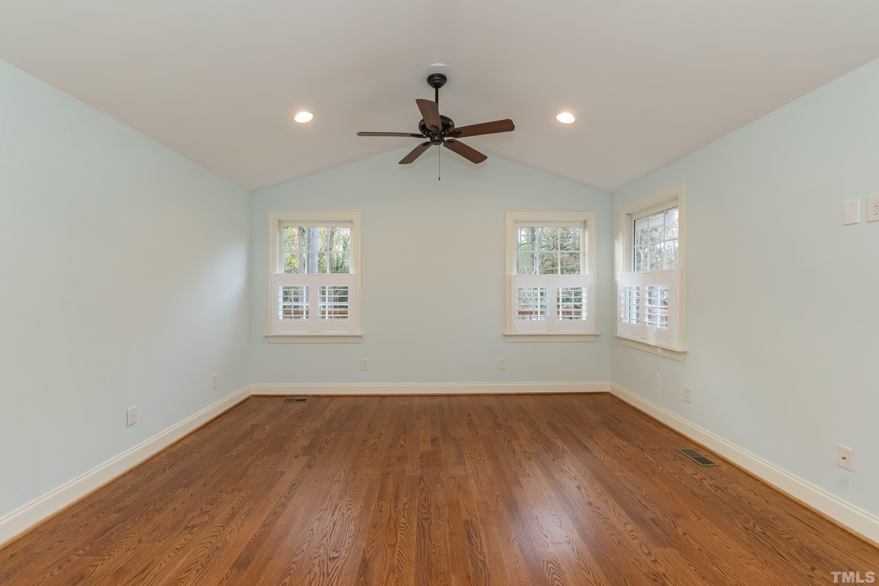 1104 Deboy Street Raleigh, NC 27606 - Photo 22 of 38 a view of a room with wooden floor and windows