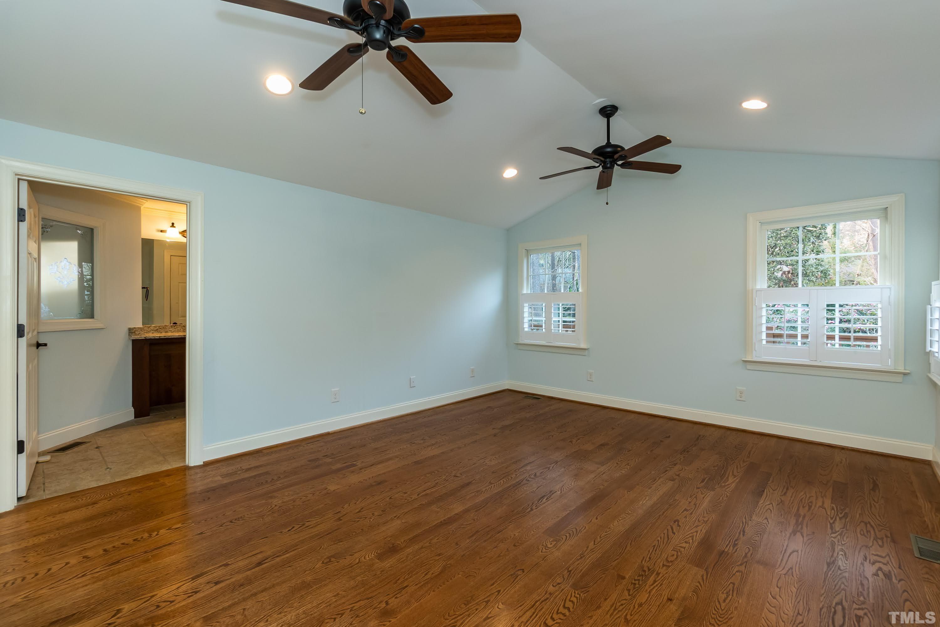 1104 Deboy Street Raleigh, NC 27606 - Photo 26 of 38 wooden floor in an empty room with a window