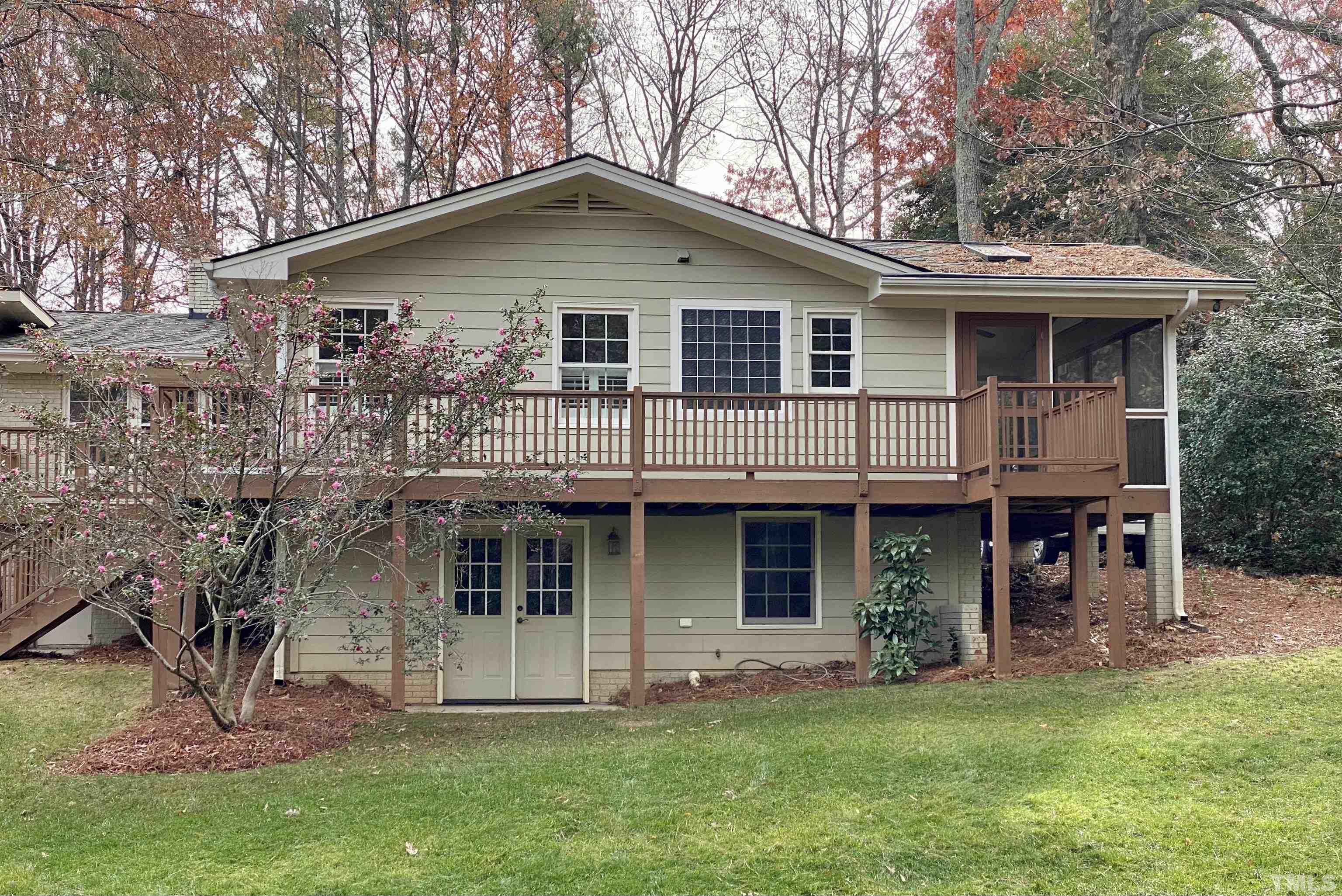 1104 Deboy Street Raleigh, NC 27606 - Photo 3 of 38 a front view of a house with a yard