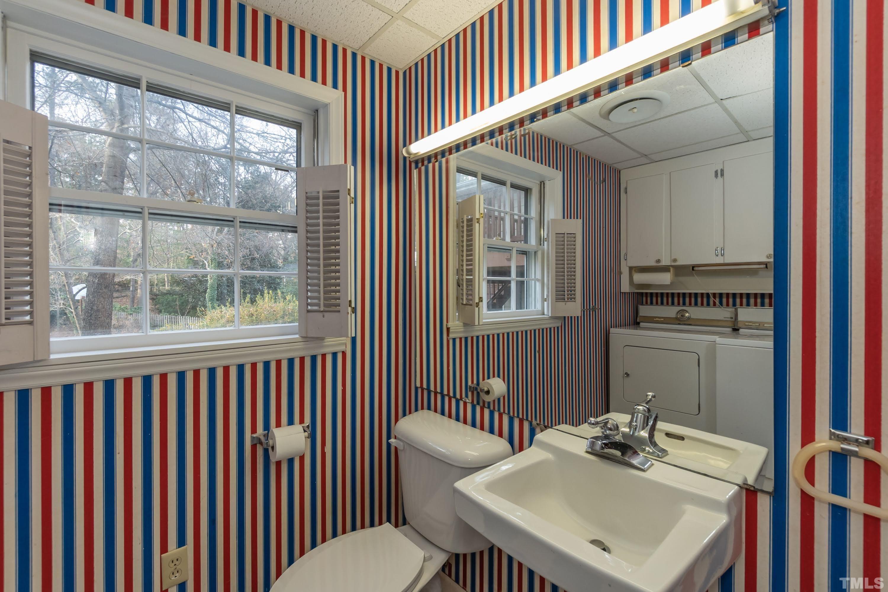 1104 Deboy Street Raleigh, NC 27606 - Photo 32 of 38 a view of a dining room with furniture window and outside view