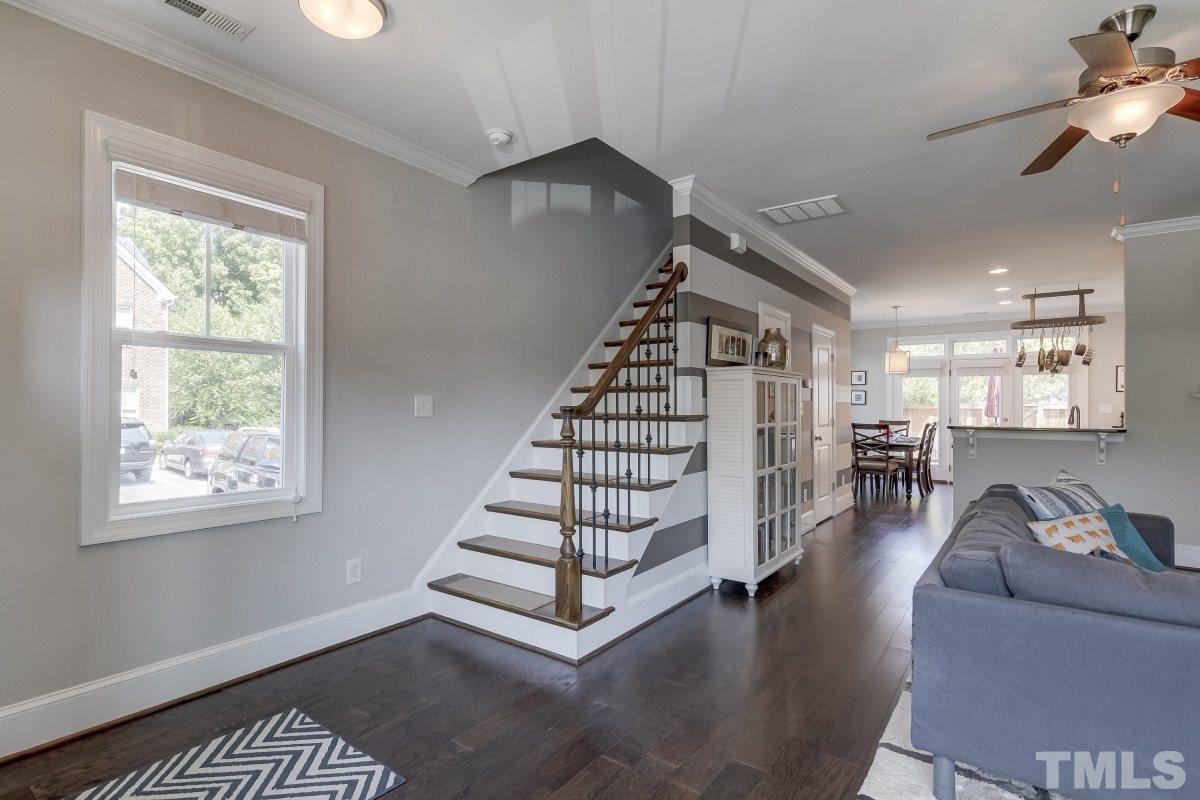 527 Ledbetter Court Raleigh, NC 27608 - Photo 2 of 13 a view of entryway and hall with wooden floor