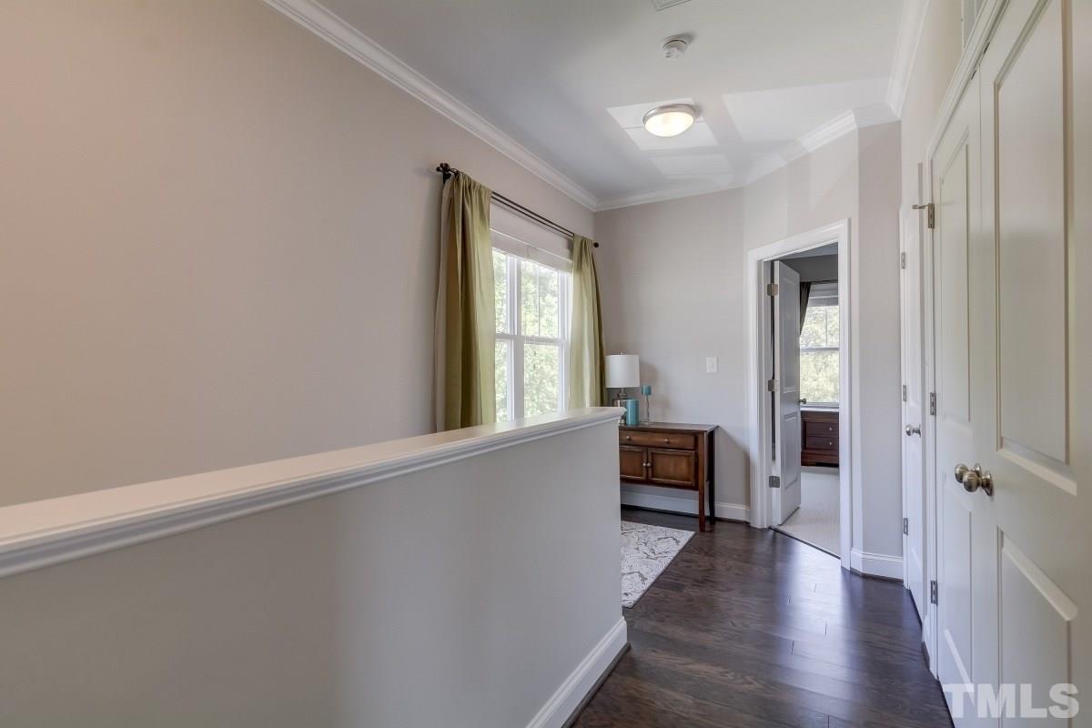 527 Ledbetter Court Raleigh, NC 27608 - Photo 12 of 13 wooden floor in an empty room with a window