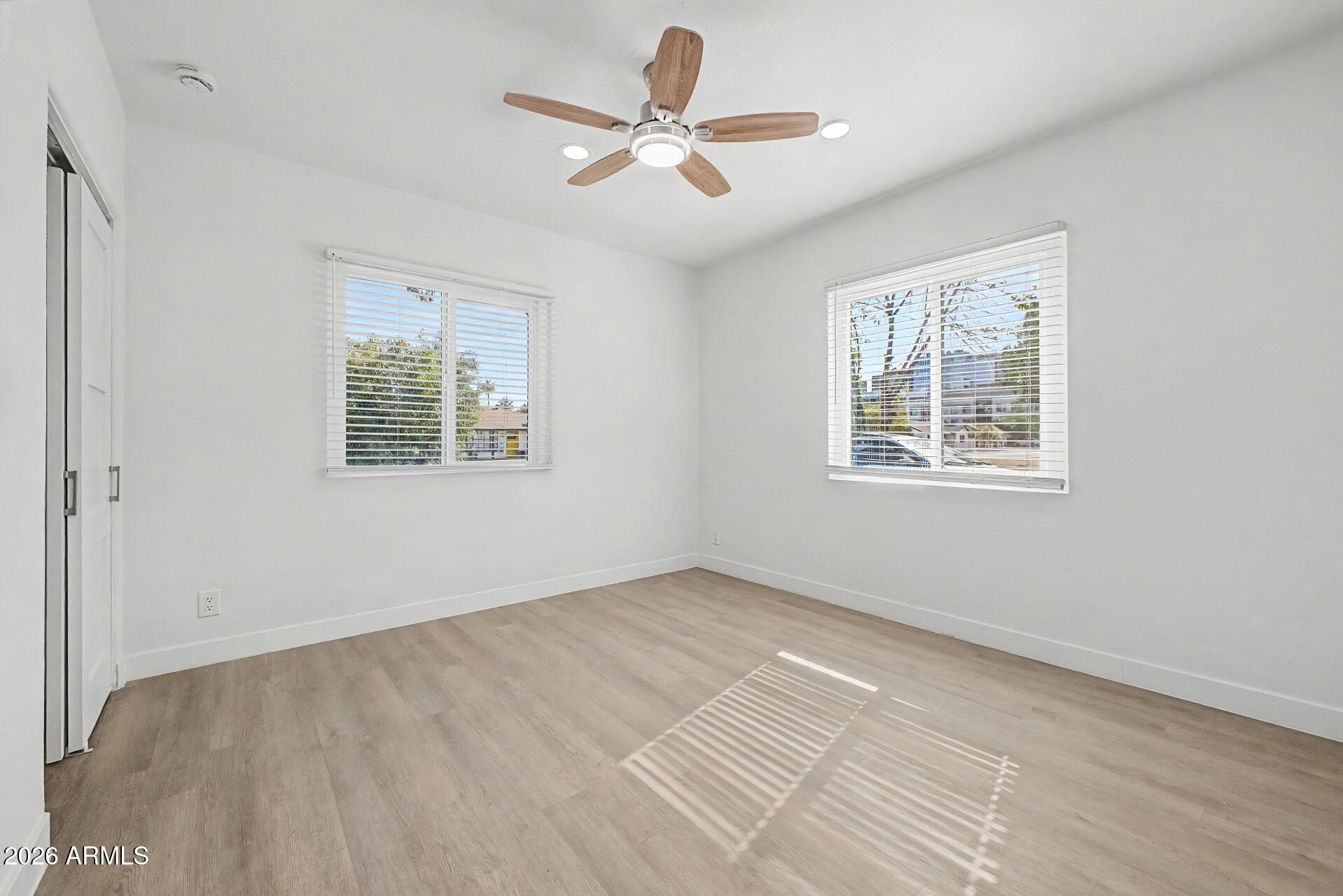 532 East Cheery Lynn Road Phoenix, AZ 85014 - Photo 23 of 37 a view of an empty room with a window