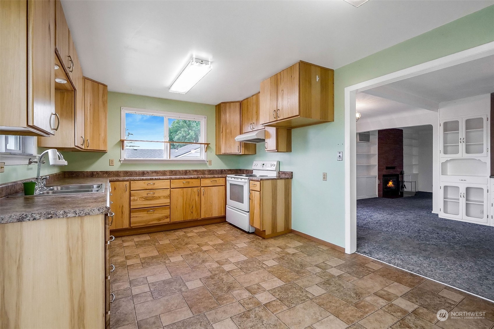 260 Maringo Road Ephrata, WA 98823 - Photo 8 of 36 a kitchen with stainless steel appliances granite countertop a stove sink and cabinets