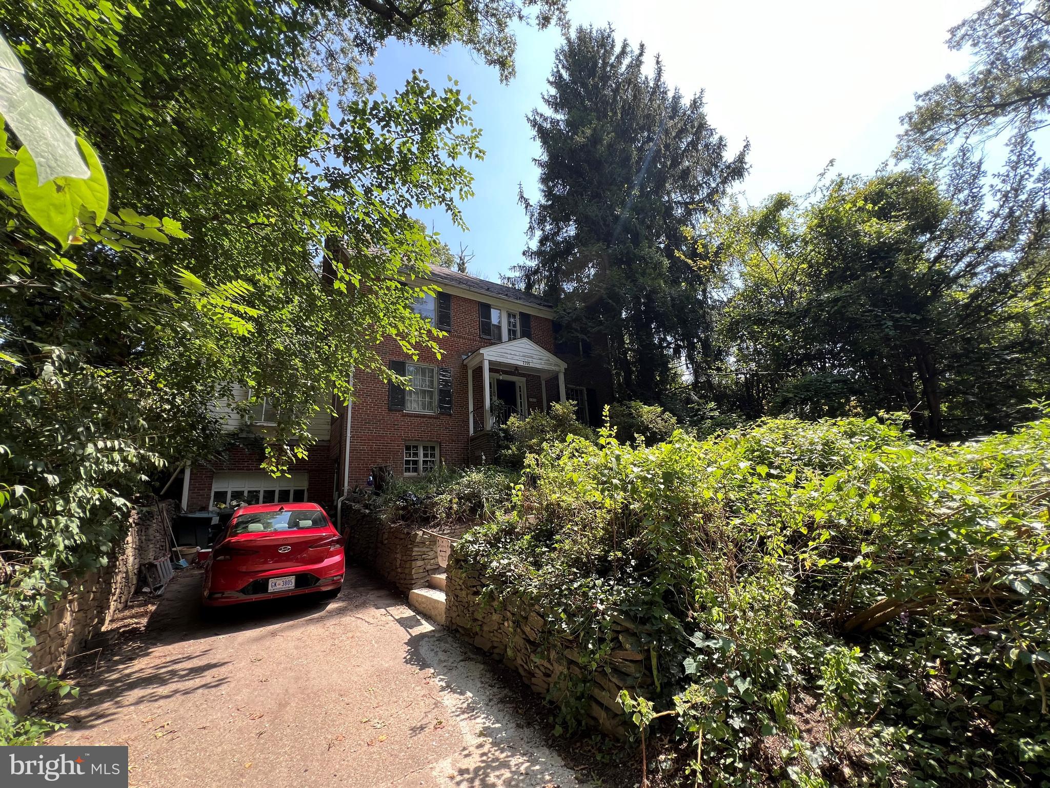 2355 49th Street Northwest Washington, DC 20007 - Photo 1 of 1 a front view of a house with a garden