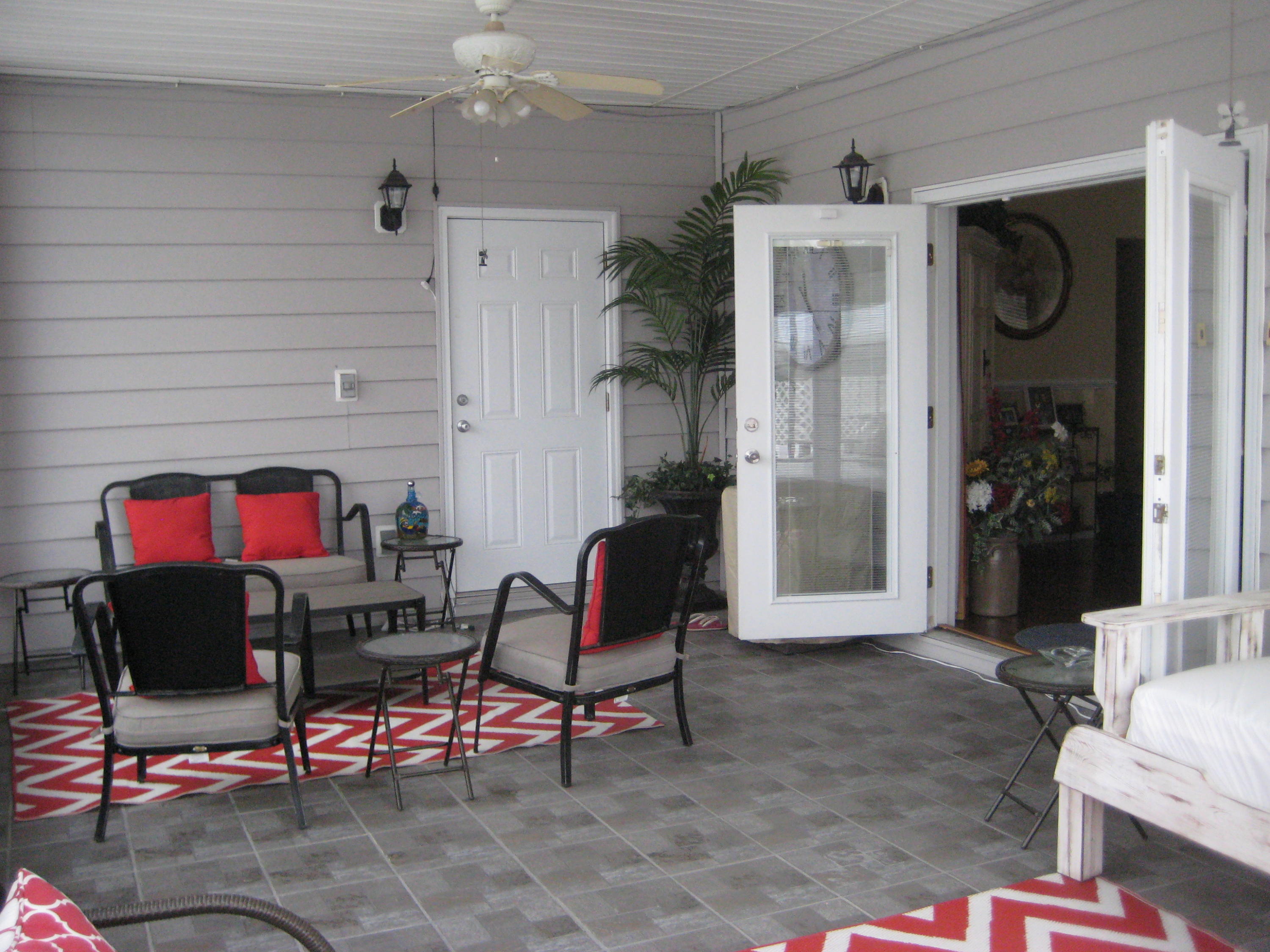 6024 Sand Hill Road Crestview, FL 32539 - Photo 15 of 43 a living room with furniture and a fireplace