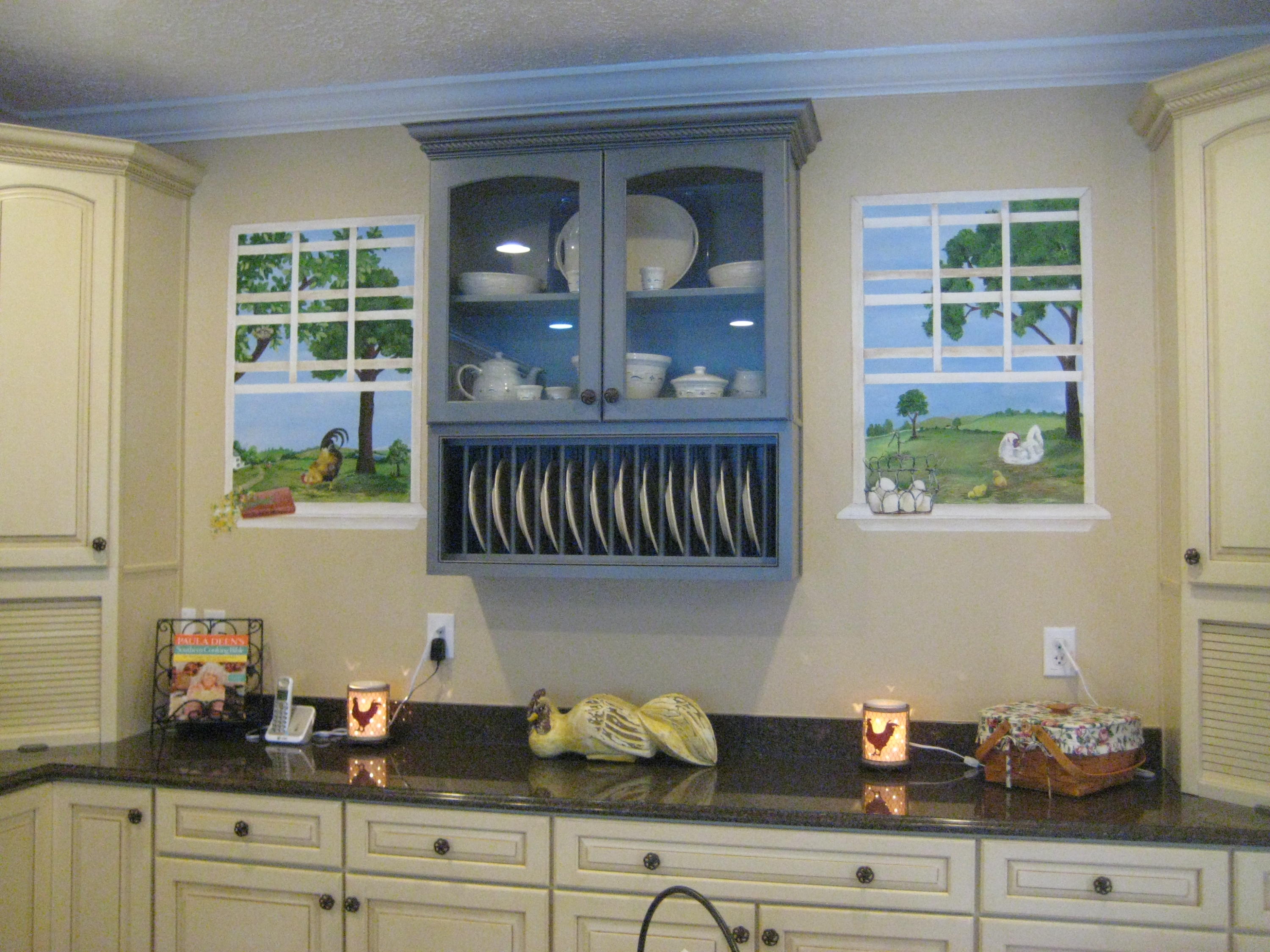 6024 Sand Hill Road Crestview, FL 32539 - Photo 42 of 43 a kitchen with a cabinets and potted plant