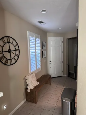 a view of workspace with a window and fireplace