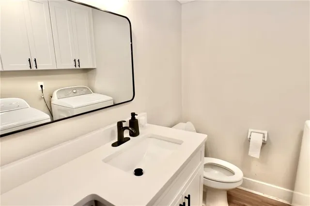 a bathroom with a sink and a toilet