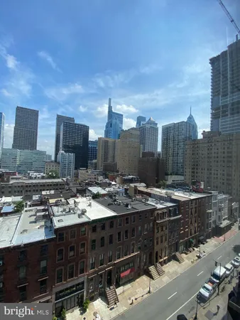 a view of a city with tall buildings