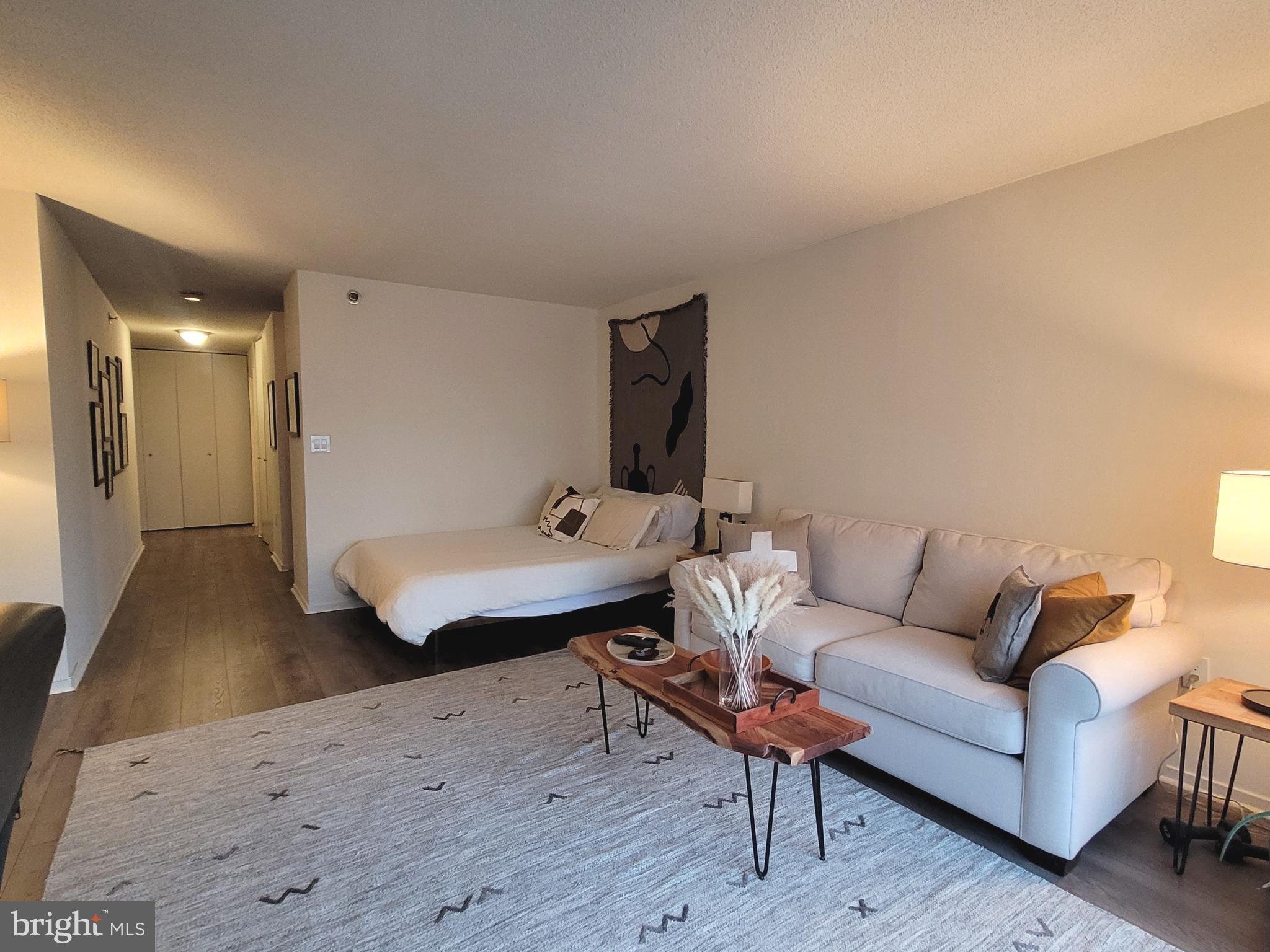 2020 Walnut Street, Unit 11A Philadelphia, PA 19103 - Photo 5 of 20 a living room with furniture and a wooden floor