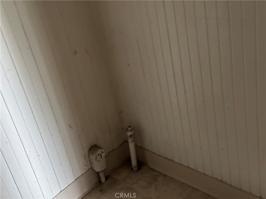 50 West 20th Street Merced, CA 95340 - Photo 13 of 20 a bathroom with a window and toilet