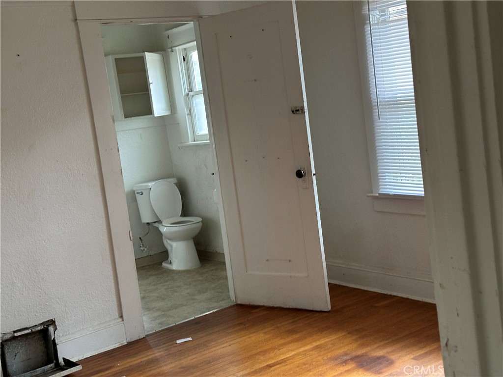50 West 20th Street Merced, CA 95340 - Photo 14 of 20 a bathroom with a sink and a toilet