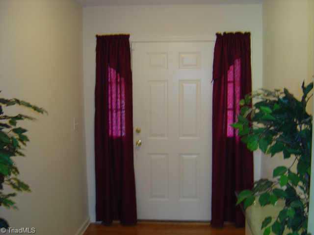 3610 Markham Road Greensboro, NC 27405 - Photo 3 of 7 Other. Foyer (8.6x6.6) beautiful laminate flooring makes an impressive entrance, door with windows on each side