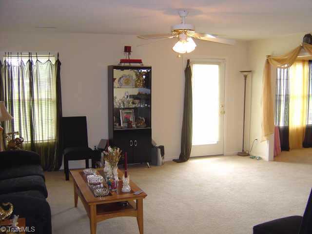 3610 Markham Road Greensboro, NC 27405 - Photo 4 of 7 Other. Spacious Living Room, French door to back yard, ceiling fan w/light kit, neutral paint carpet, lots of natural light.