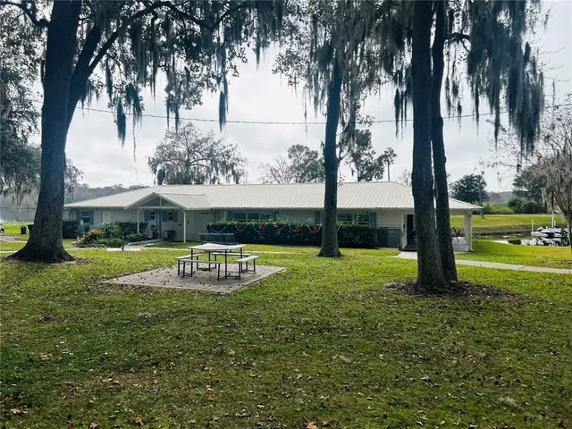 a view of a lake with a big yard