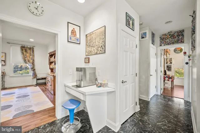 a bathroom with a sink a vanity and a bathtub