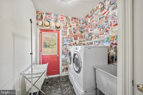 a bedroom with a bed furniture and a book shelf