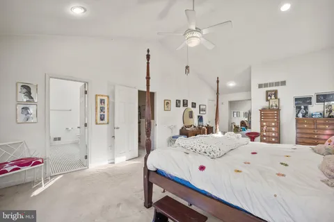 a balcony with table and chairs